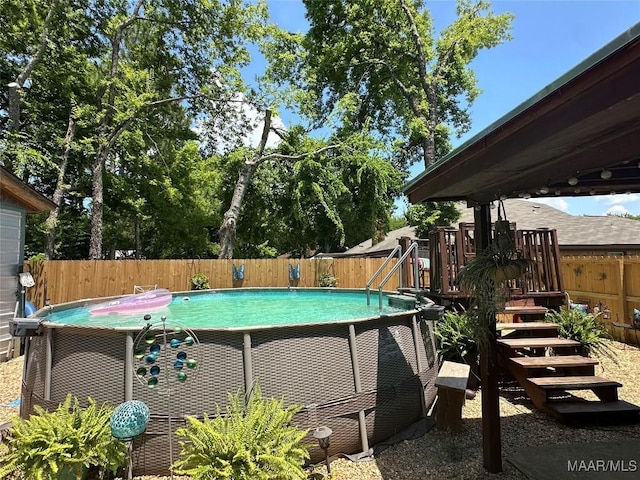 4525 Lisa Ct, Montgomery, AL 36106 - view of pool featuring a wooden deck and a fenced backyard