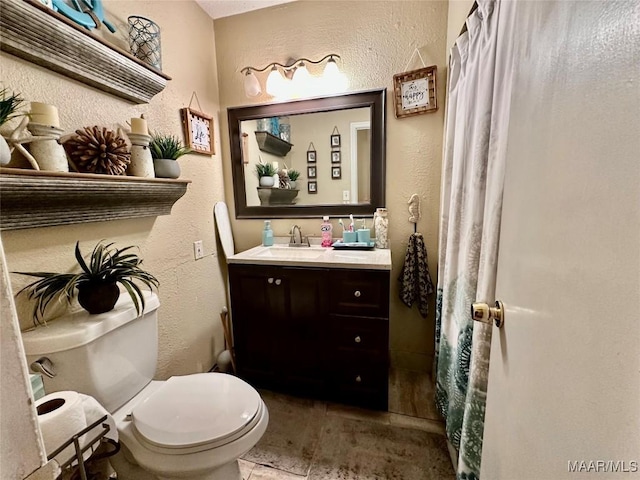 4525 Lisa Ct, Montgomery, AL 36106 - full bathroom with vanity and a textured wall