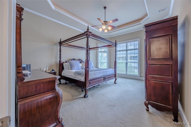 742 Mckeithen Pl, Millbrook, AL 36054 - bedroom featuring a raised ceiling, light colored carpet, and crown molding
