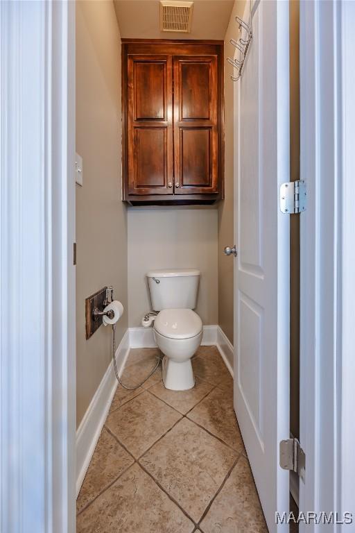 742 Mckeithen Pl, Millbrook, AL 36054 - bathroom featuring baseboards and tile patterned floors
