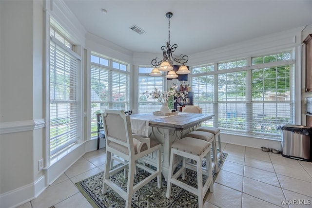742 Mckeithen Pl, Millbrook, AL 36054 - dining space featuring a chandelier and light tile patterned flooring