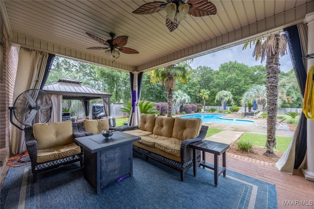 742 Mckeithen Pl, Millbrook, AL 36054 - fenced backyard with an outdoor hangout area, a gazebo, ceiling fan, and a patio area