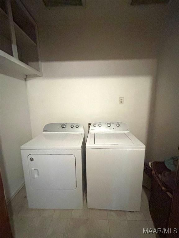 309 Broad St, Camden, AL 36726 - washroom with washer and clothes dryer