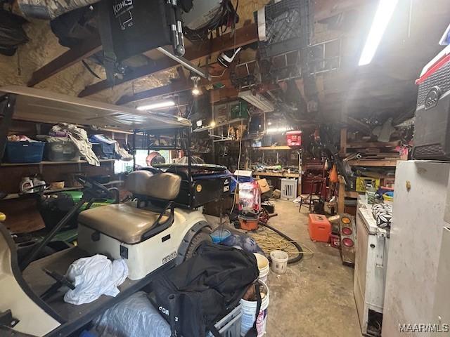 124 Reid Cir, Deatsville, AL 36022 - garage with a workshop area