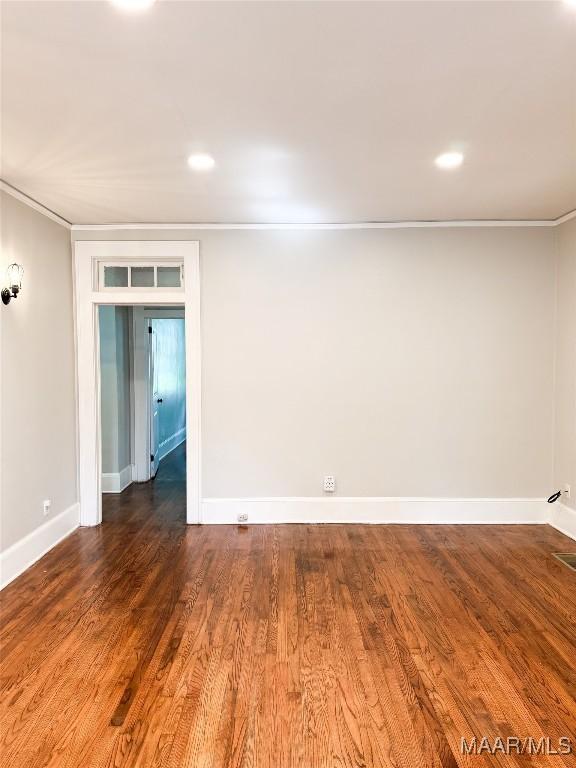 3155 Wilmington Rd, Montgomery, AL 36105 - empty room with wood finished floors, recessed lighting, and ornamental molding