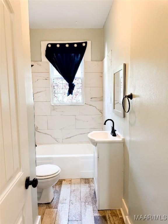 3155 Wilmington Rd, Montgomery, AL 36105 - bathroom with vanity and bathing tub / shower combination