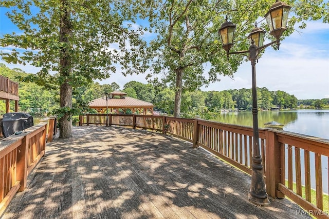 215 Hickory Rd, Titus, AL 36080 - wooden deck with a grill, a gazebo, and a water view