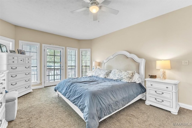 215 Hickory Rd, Titus, AL 36080 - bedroom with light colored carpet, access to outside, and ceiling fan