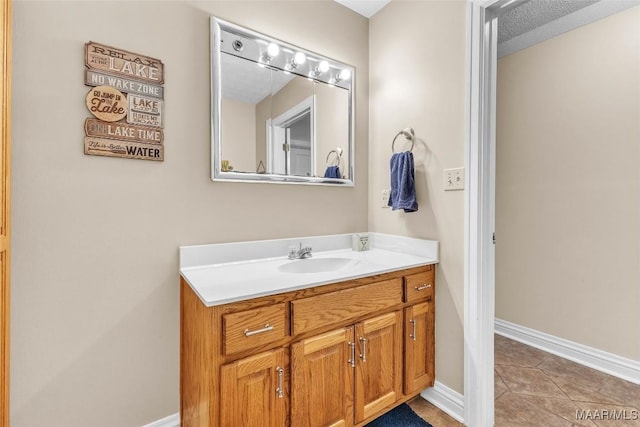 215 Hickory Rd, Titus, AL 36080 - bathroom with vanity and tile patterned flooring