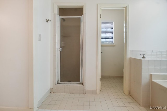 6605 E Aberdeen Dr, Montgomery, AL 36116 - full bathroom featuring a stall shower, a bath, and tile patterned floors