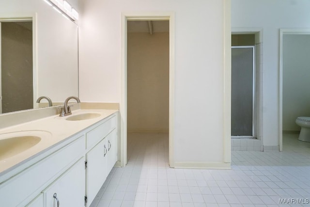 6605 E Aberdeen Dr, Montgomery, AL 36116 - full bath featuring double vanity, a shower stall, and tile patterned flooring