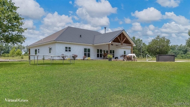 362 Driver Rd, Deatsville, AL 36022 - rear view of property with a yard and a metal roof