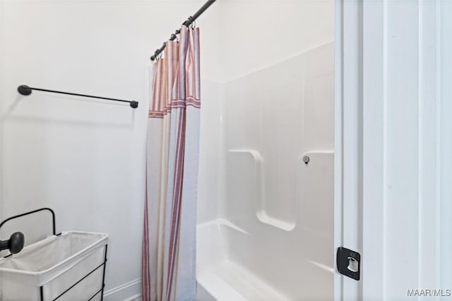 362 Driver Rd, Deatsville, AL 36022 - bathroom featuring shower / bath combination with curtain and baseboards
