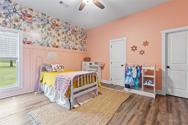 362 Driver Rd, Deatsville, AL 36022 - bedroom featuring wallpapered walls, a wainscoted wall, wood finished floors, and a ceiling fan