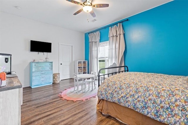 362 Driver Rd, Deatsville, AL 36022 - bedroom with wood finished floors and ceiling fan