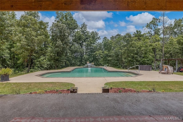 362 Driver Rd, Deatsville, AL 36022 - outdoor pool featuring a patio area, view of scattered trees, and a lawn
