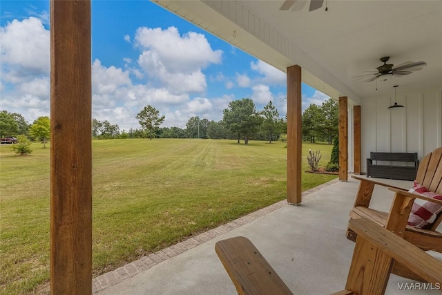362 Driver Rd, Deatsville, AL 36022 - view of grassy yard with a ceiling fan, a patio, and view of scattered trees