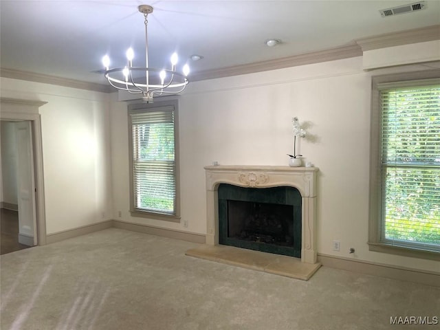 9858 Wynchase Cir, Montgomery, AL 36117 - unfurnished living room with a fireplace with raised hearth, a chandelier, carpet floors, and ornamental molding