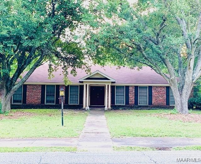 3874 Antoinette Dr, Montgomery, AL 36111 - ranch-style home featuring a front yard and brick siding