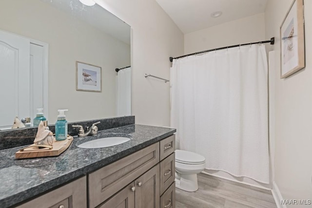 174 Shadow Wood Ln, Wetumpka, AL 36092 - bathroom featuring wood finished floors and vanity