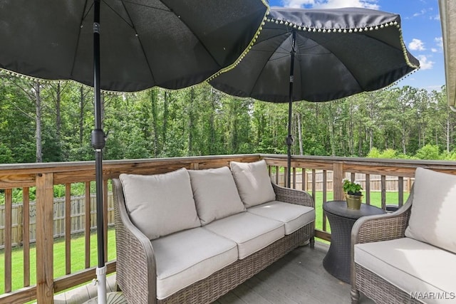 174 Shadow Wood Ln, Wetumpka, AL 36092 - wooden deck featuring outdoor lounge area and a forest view