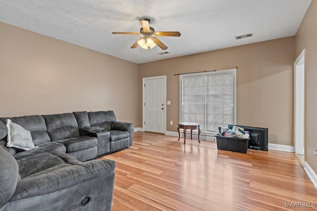 1018 Austin St, Wetumpka, AL 36092 - living room with ceiling fan and light wood finished floors