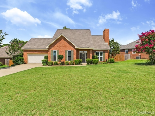 7467 Old Pump Rd, Montgomery, AL 36117 - view of front of home with concrete driveway, a chimney, an attached garage, and roof with shingles