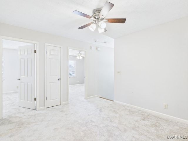7467 Old Pump Rd, Montgomery, AL 36117 - unfurnished bedroom with light carpet and ceiling fan