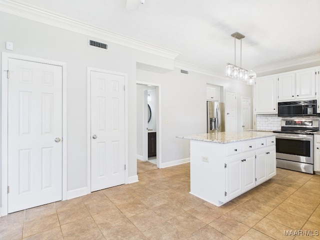 7467 Old Pump Rd, Montgomery, AL 36117 - kitchen with appliances with stainless steel finishes, ornamental molding, white cabinetry, tasteful backsplash, and light stone countertops