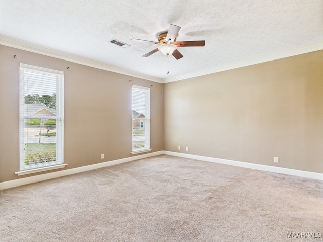 7467 Old Pump Rd, Montgomery, AL 36117 - carpeted empty room with ceiling fan, healthy amount of natural light, crown molding, and a textured ceiling