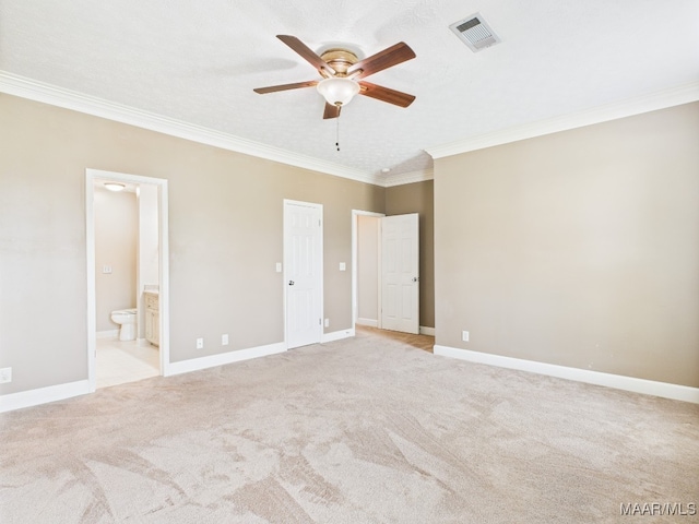 7467 Old Pump Rd, Montgomery, AL 36117 - unfurnished bedroom featuring ornamental molding, ensuite bath, light carpet, and a ceiling fan