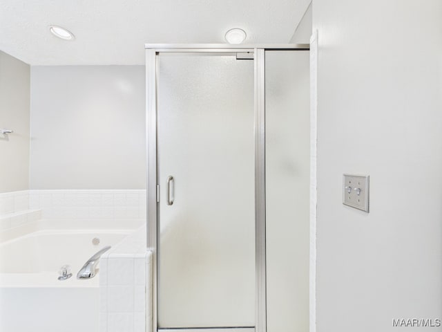 7467 Old Pump Rd, Montgomery, AL 36117 - bathroom with a shower stall and a garden tub