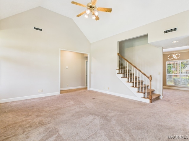 7467 Old Pump Rd, Montgomery, AL 36117 - unfurnished living room with high vaulted ceiling, stairs, carpet flooring, a chandelier, and a ceiling fan