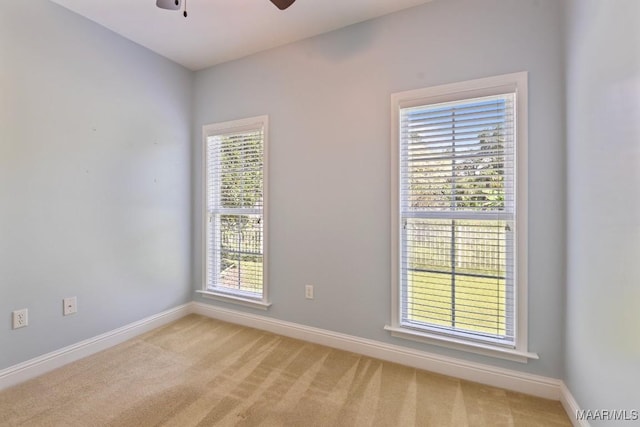 2196 N Ann Ave, Tallassee, AL 36078 - spare room featuring a ceiling fan and light carpet