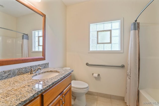 2196 N Ann Ave, Tallassee, AL 36078 - full bath featuring vanity, tile patterned flooring, and shower / tub combo with curtain