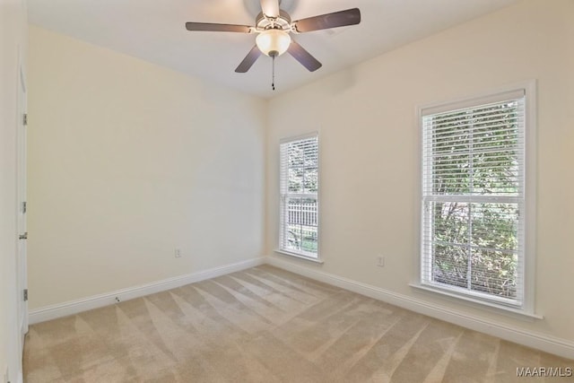 2196 N Ann Ave, Tallassee, AL 36078 - empty room featuring light colored carpet and ceiling fan