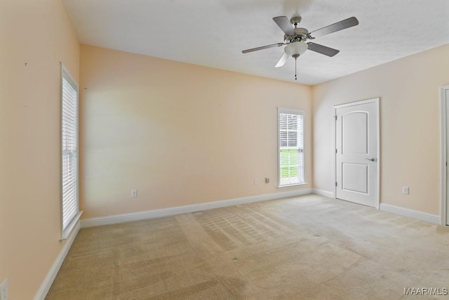 2196 N Ann Ave, Tallassee, AL 36078 - unfurnished room featuring light carpet and a ceiling fan