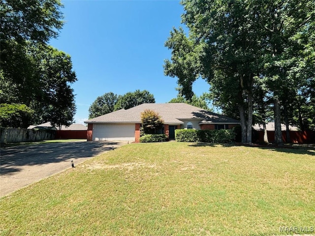 7908 Arrowhead Forest Ct, Montgomery, AL 36117 - ranch-style house featuring asphalt driveway and an attached garage