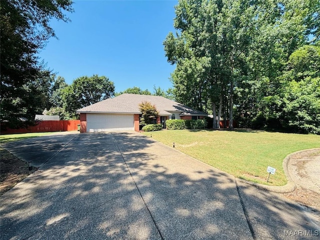 7908 Arrowhead Forest Ct, Montgomery, AL 36117 - ranch-style house with driveway and an attached garage