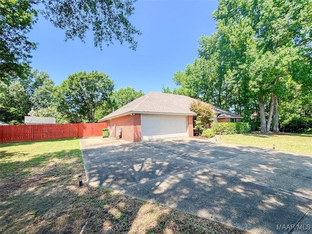 7908 Arrowhead Forest Ct, Montgomery, AL 36117 - view of home's exterior with driveway and an attached garage