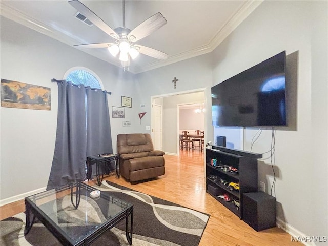 7908 Arrowhead Forest Ct, Montgomery, AL 36117 - living area with wood finished floors, ornamental molding, and ceiling fan