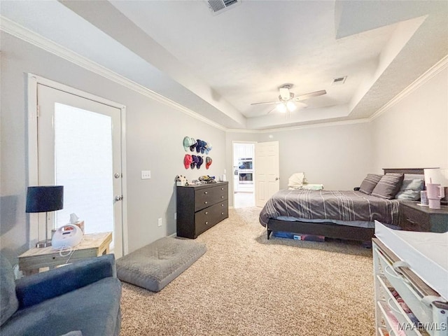 7908 Arrowhead Forest Ct, Montgomery, AL 36117 - carpeted bedroom with a tray ceiling, crown molding, and ceiling fan