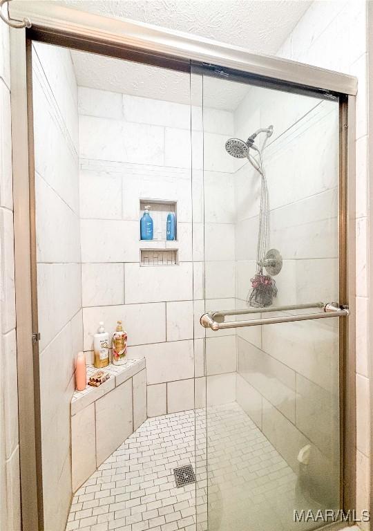 7908 Arrowhead Forest Ct, Montgomery, AL 36117 - bathroom with a stall shower