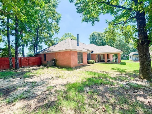 7908 Arrowhead Forest Ct, Montgomery, AL 36117 - back of house featuring brick siding