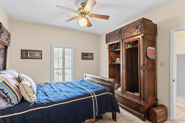 8872 Old Magnolia Way, Montgomery, AL 36116 - bedroom with light carpet and a ceiling fan