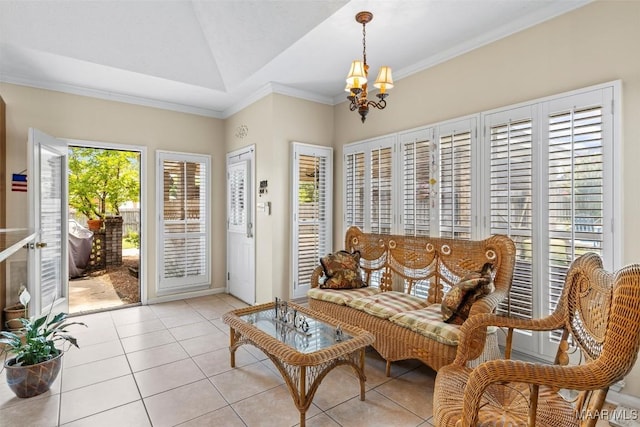 8872 Old Magnolia Way, Montgomery, AL 36116 - living room with a chandelier, crown molding, light tile patterned flooring, and lofted ceiling