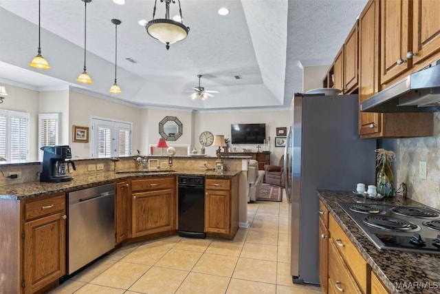 8872 Old Magnolia Way, Montgomery, AL 36116 - kitchen with stainless steel appliances, under cabinet range hood, brown cabinetry, a ceiling fan, and ornamental molding