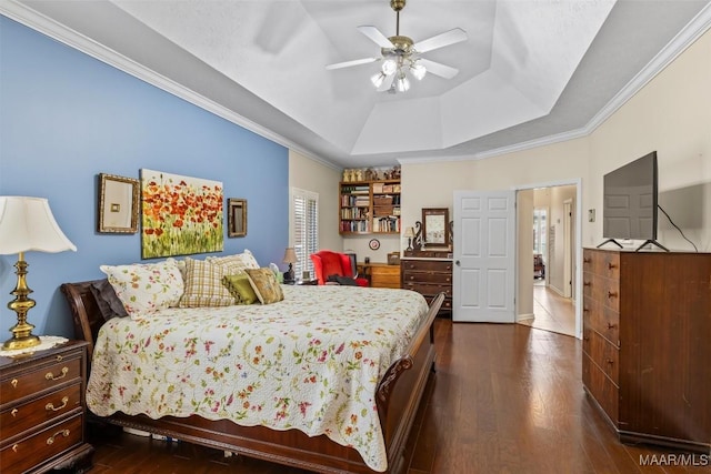 8872 Old Magnolia Way, Montgomery, AL 36116 - bedroom featuring a tray ceiling, dark wood-style flooring, crown molding, and ceiling fan