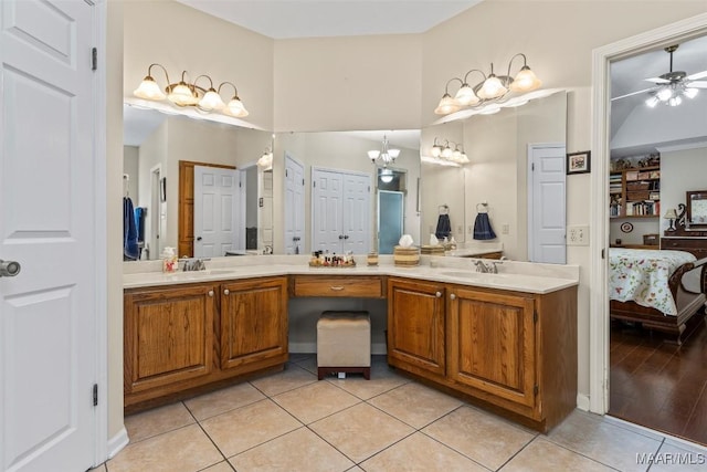 8872 Old Magnolia Way, Montgomery, AL 36116 - ensuite bathroom with double vanity, ceiling fan, and tile patterned floors