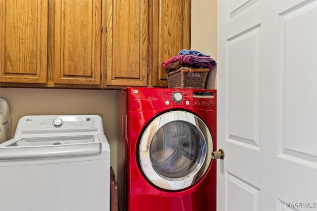 8872 Old Magnolia Way, Montgomery, AL 36116 - washroom featuring washing machine and dryer and cabinet space